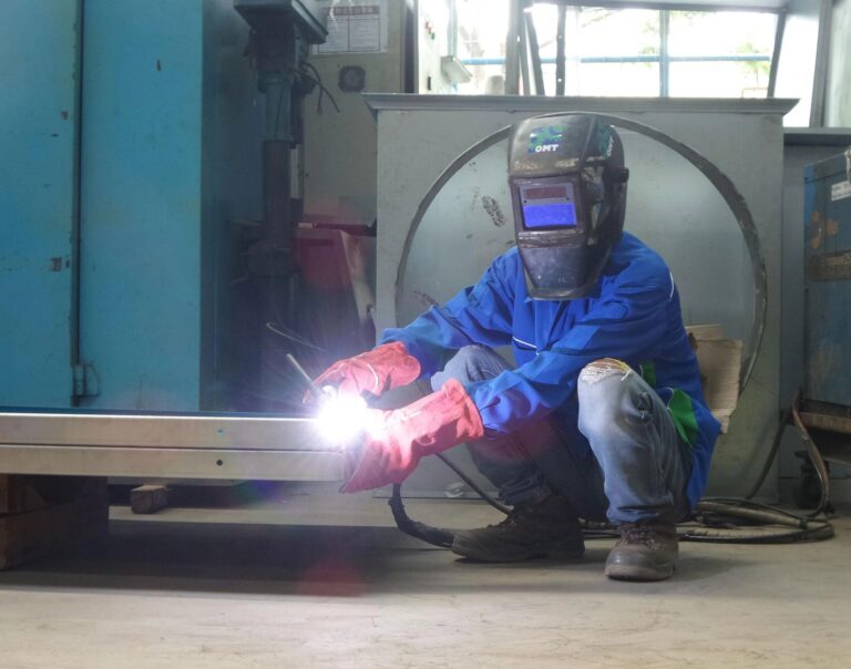 Technician performing argon (TIG) welding