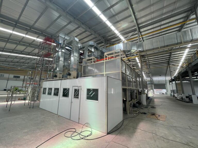 Painting line with overhead conveyor built by Ovindo