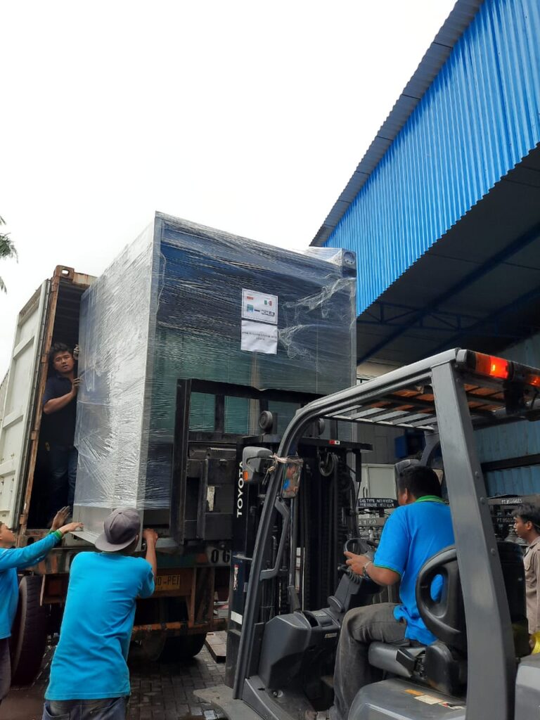 Rework booths packed and loaded into a container for export to Mexico