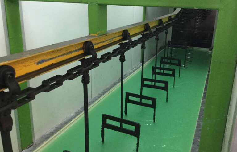 Pre-treatment dip tanks with overhead conveyor